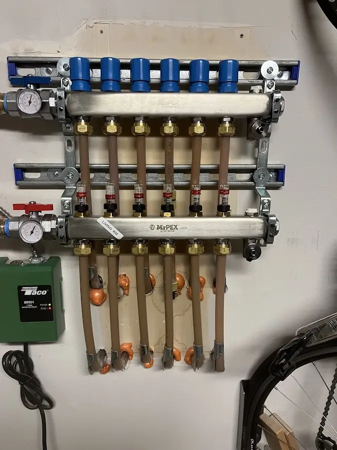 Plumber performing Gas Line Installation at a residential property in Ligonier